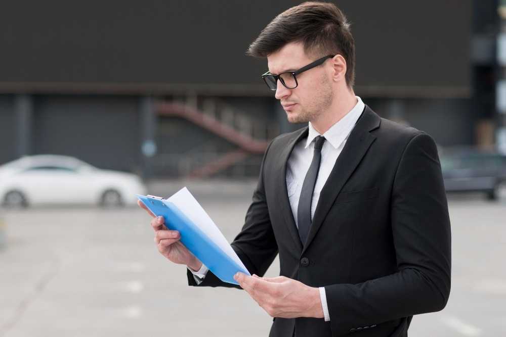 find-wholesale-real-estate-deals Real estate investor scouting off-market properties for wholesale deal.
How to Find Wholesale Real Estate Deals